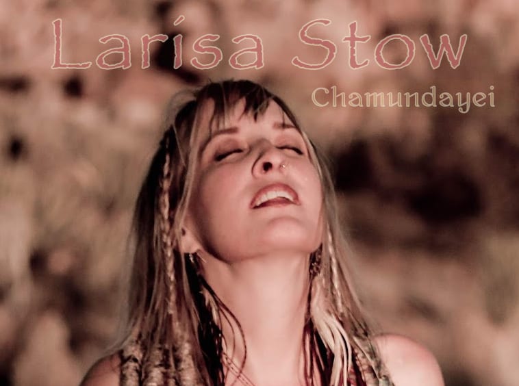 Larisa Stow radiates bliss in the ecstasy of chanting mantra.